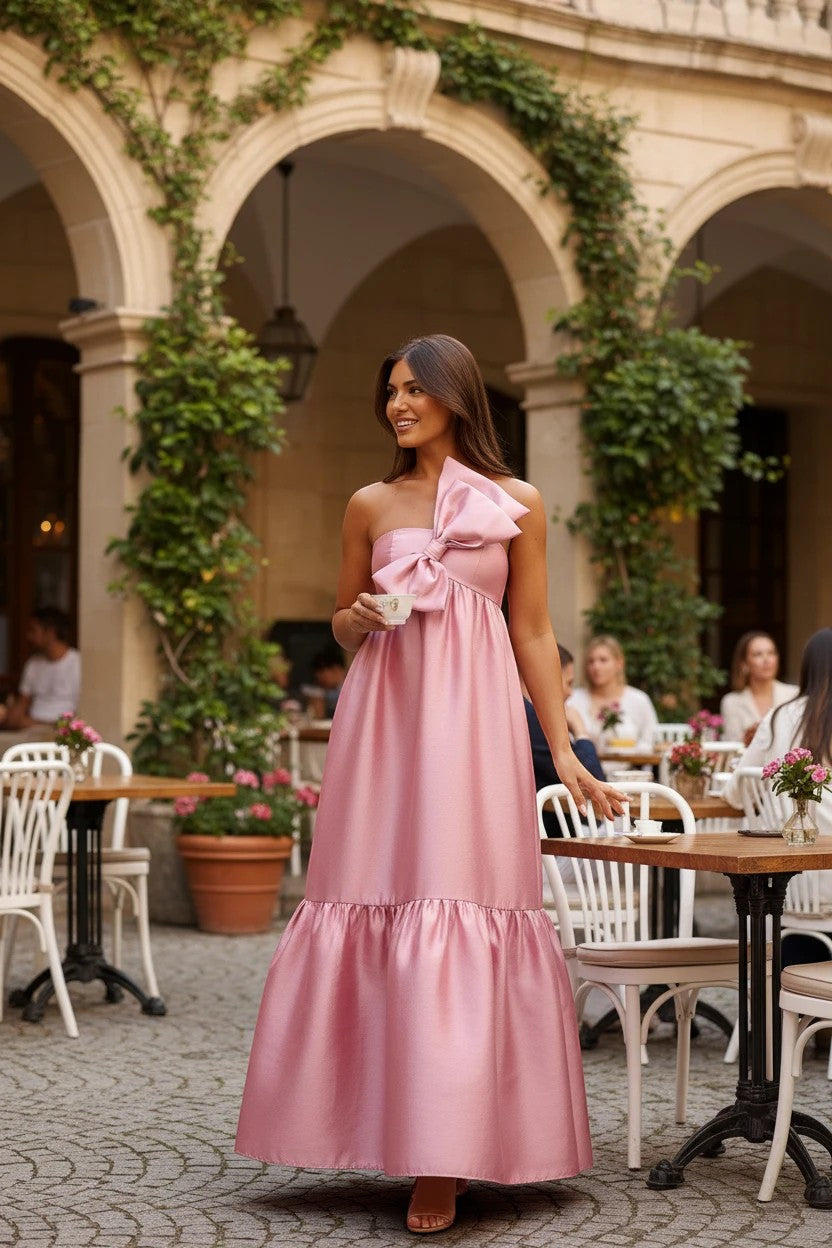 Robe de demoiselle d'honneur Valerelle longue vieux rose avec un grand nœud décoratif sur le buste en terrasse
